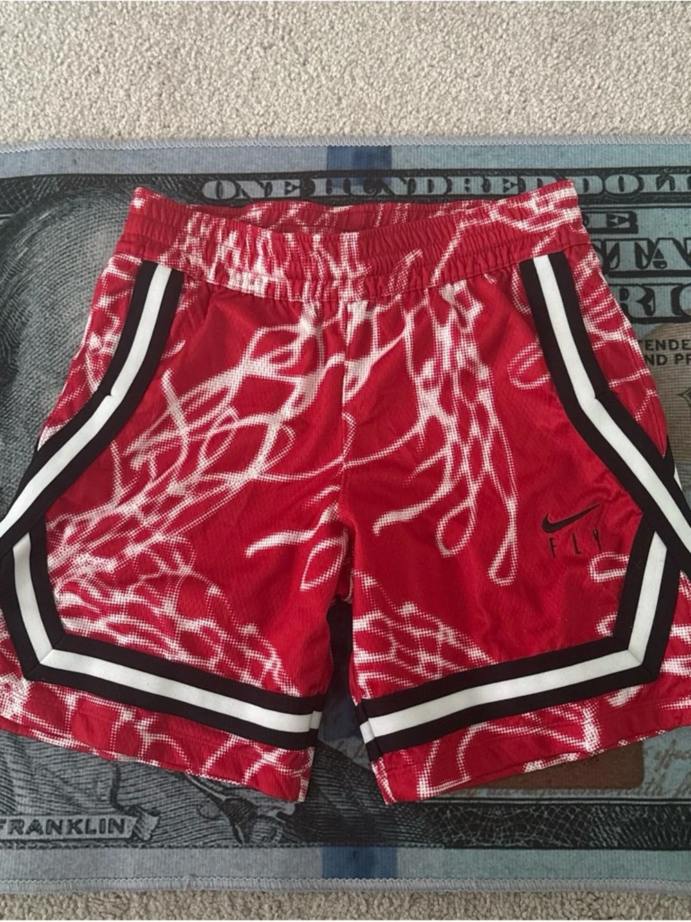 Nike red with white design fly shorts